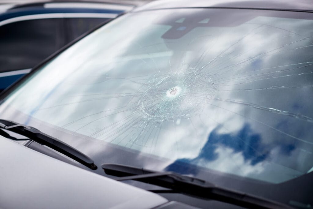 Cracked glass assessed before professional Windscreen Replacement